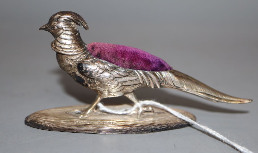 An Edwardian novelty silver mounted pin cushion, modelled as a pheasant by S. Mordan & Co, Chester, 1904,